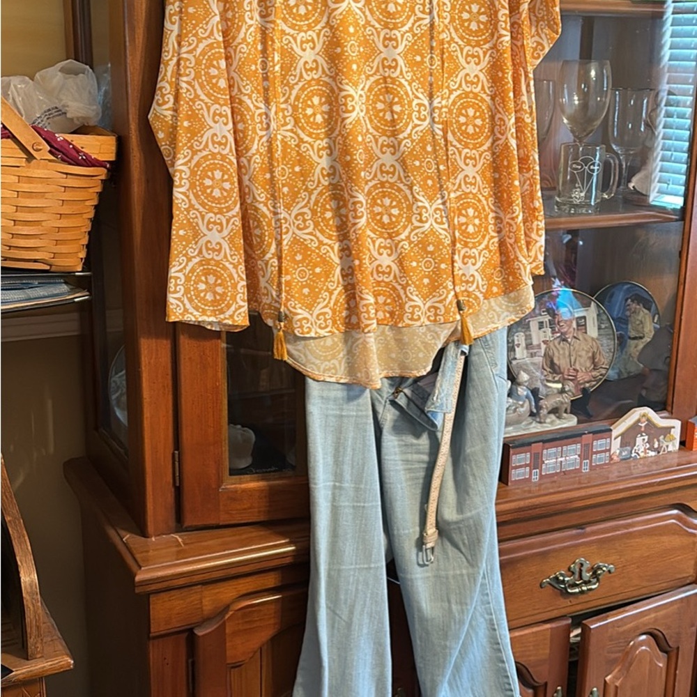Orange Patterned Blouse with Light Blue Jeans